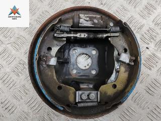 Механизм развода задних тормозных колодок левый Nissan Note E11 [рестайлинг] 2009, 1.4 л., бензин, МКПП, серый, хетчбэк 5 дв.