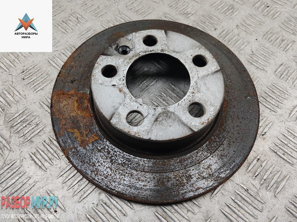 диск тормозной задний Volkswagen Golf 4 поколение 1998, 1.6 л., бензин, МКПП, серый, хетчбэк 5 дв. - фото №1