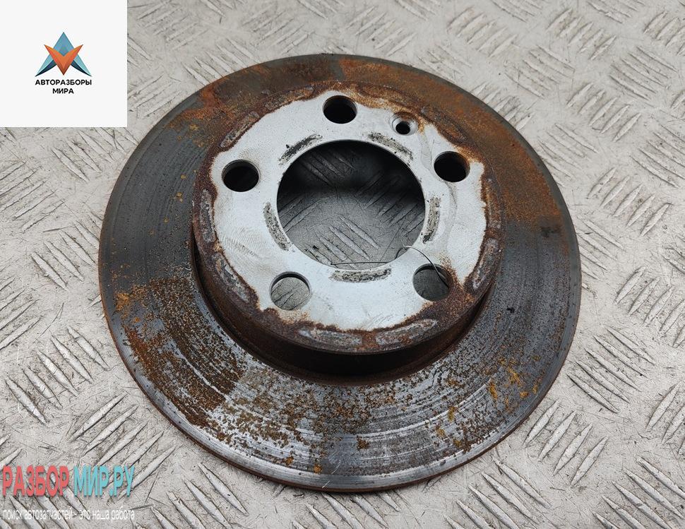 диск тормозной задний Volkswagen Golf 4 поколение 2000, 2.0 л., бензин, АКПП, серый, универсал - фото №1