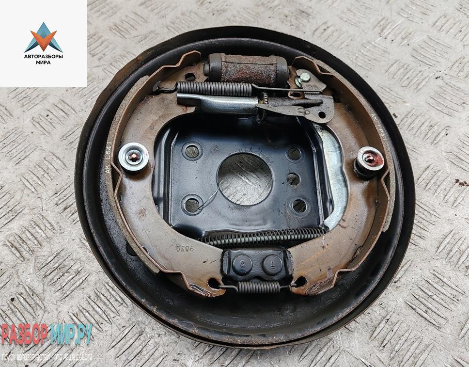 Механизм развода задних тормозных колодок левый Mitsubishi Space Star/Mirage ) 2019, 1.0 л., бензин, МКПП, серый, хетчбэк 5 дв. - фото №1