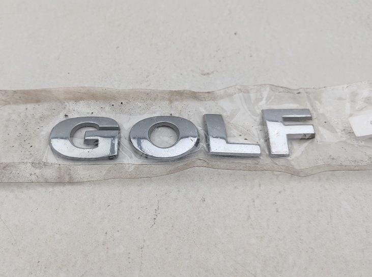 эмблема Volkswagen Golf 4 поколение 1998, 1.4 л., бензин, МКПП, серый, хетчбэк 5 дв. - фото №1