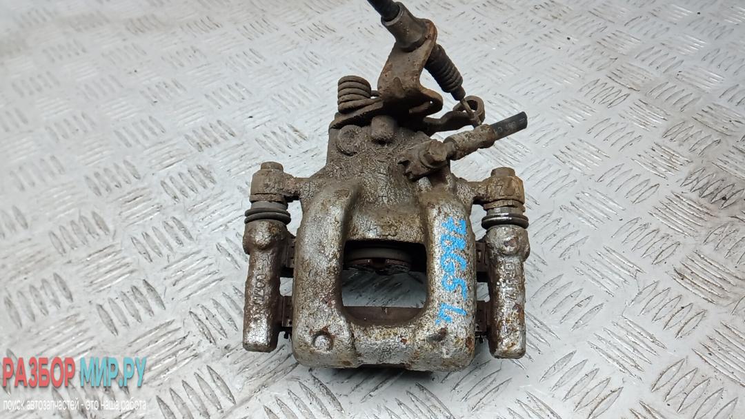 суппорт задний левый Skoda Yeti 1 поколение 2011, 2.0 л., дизель, МКПП, внедорожник 5 дв. - фото №1