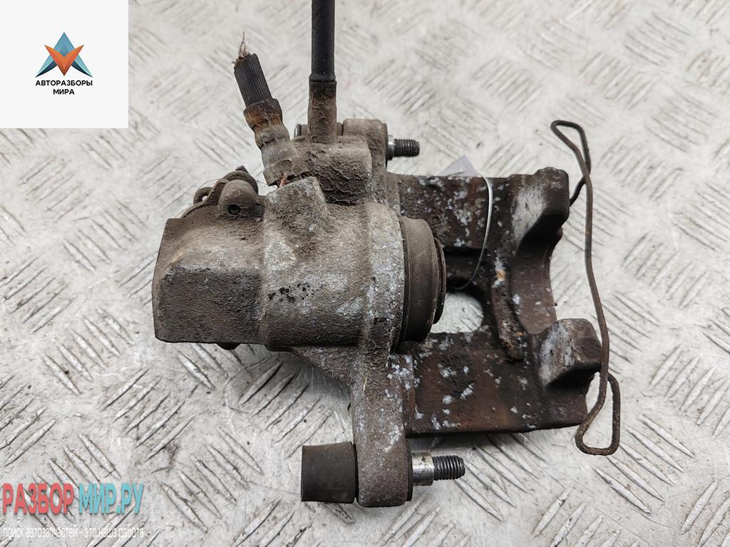 суппорт задний левый Mazda 5 CR 2006, 2.0 л., дизель, МКПП, серый, минивэн - фото №1