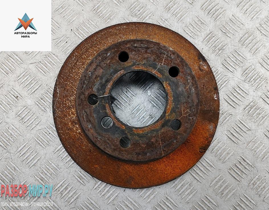 диск тормозной задний BMW 3 серия E36 1995, 1.8 л., бензин, МКПП, серый, хетчбэк 3 дв. - фото №1