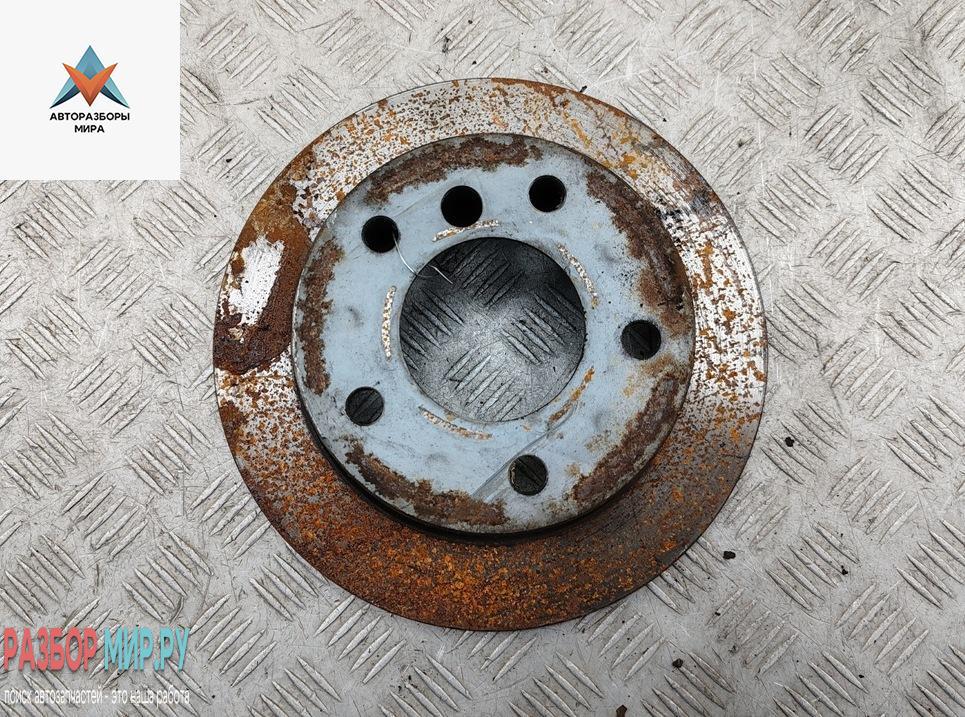 диск тормозной задний BMW 3 серия E36 1995, 1.8 л., бензин, АКПП, синий, хетчбэк 3 дв. - фото №1