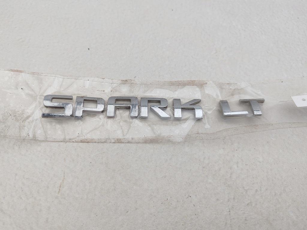 эмблема Chevrolet Spark 2010, 1.2 л., бензин, МКПП, красный, хетчбэк 5 дв.