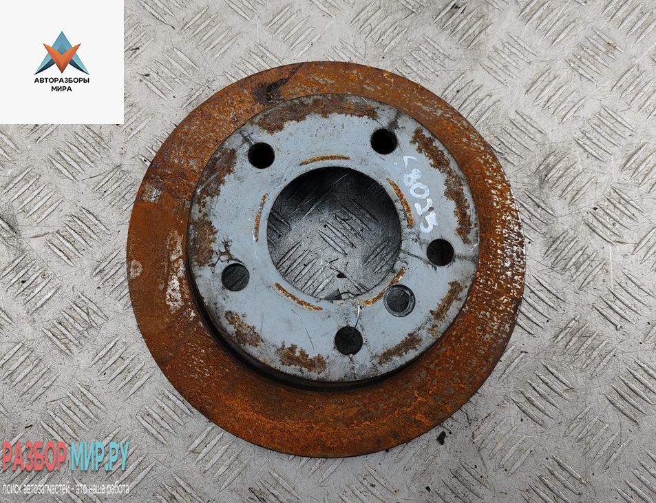 диск тормозной задний BMW 3 серия E36 1995, 1.8 л., бензин, АКПП, синий, хетчбэк 3 дв. - фото №1