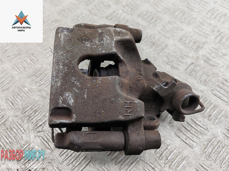 суппорт задний правый Renault Laguna 3 поколение 2008, 2.0 л., дизель, АКПП, чёрный, универсал - фото №1