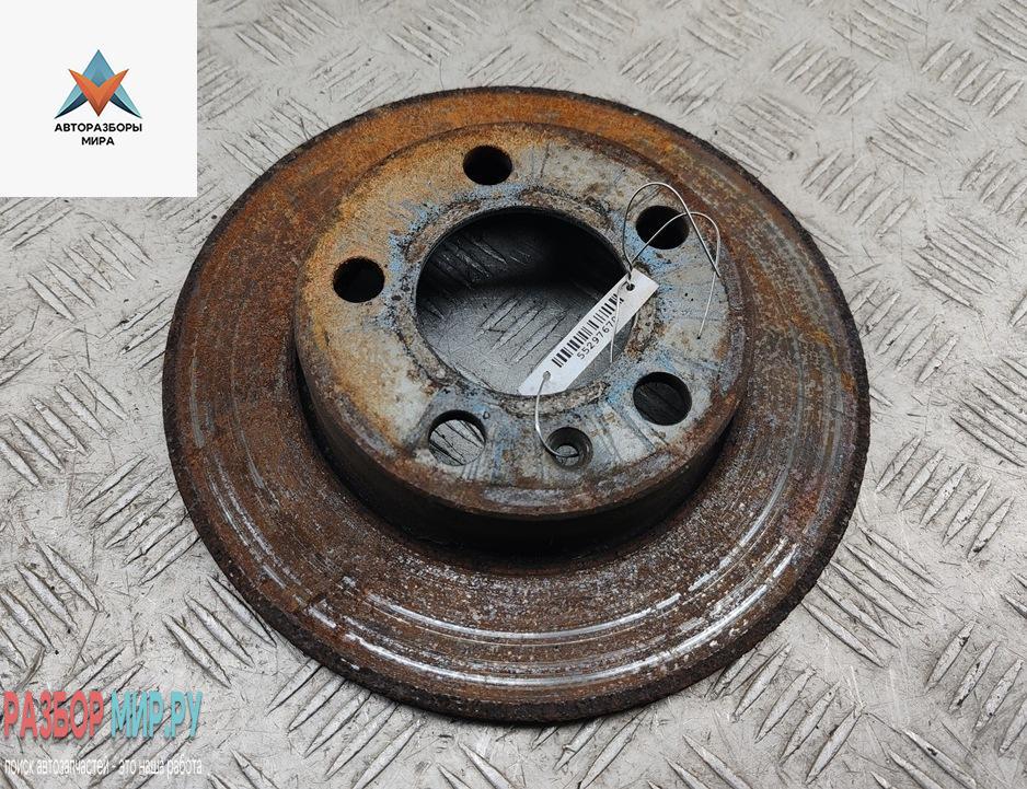 диск тормозной задний Volkswagen Golf 4 поколение 1999, 1.6 л., бензин, МКПП, синий, универсал - фото №1