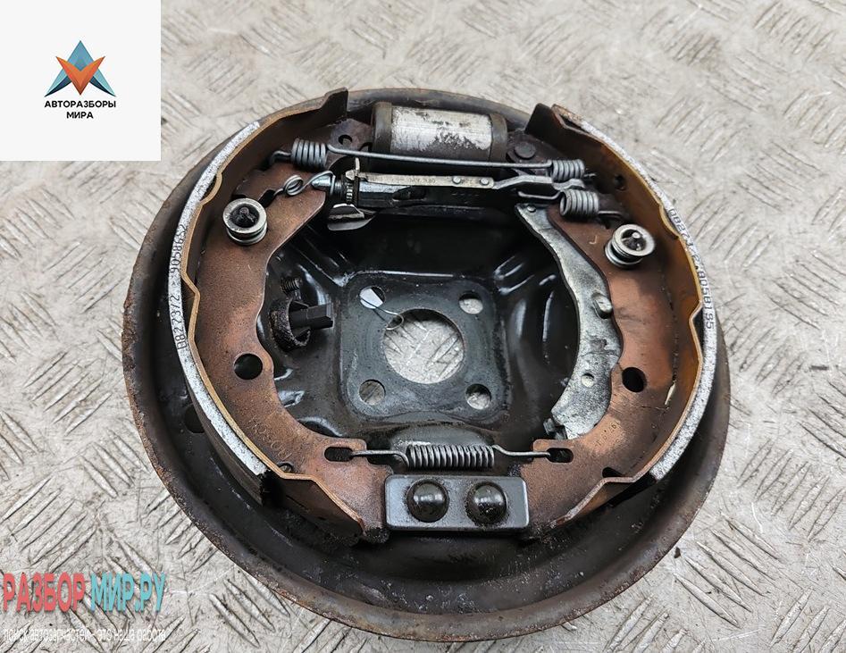 Механизм развода задних тормозных колодок левый Dacia (Renault) Sandero I 2009, 1.4 л., бензин, МКПП, синий, хетчбэк 5 дв. - фото №1