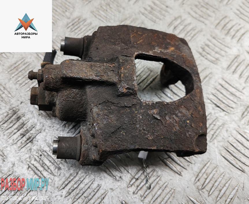 суппорт задний левый Chrysler Voyager 5 поколение 2007, 2.8 л., дизель, АКПП, серый, минивэн - фото №1