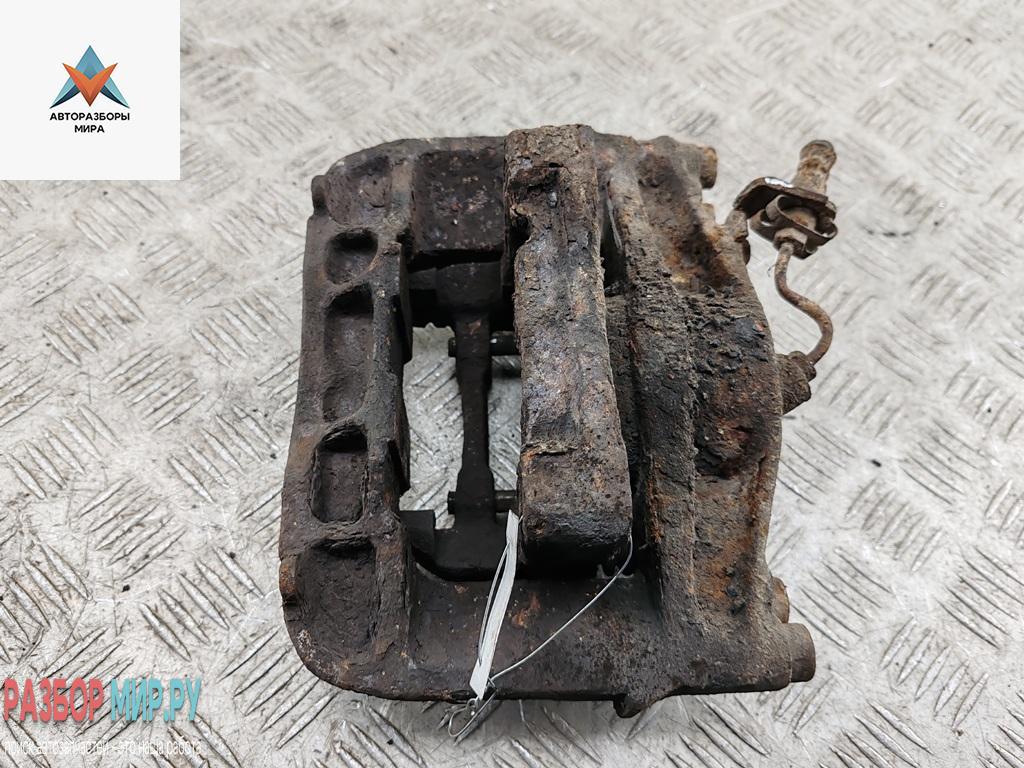 суппорт передний левый Volkswagen Transporter T4 1993, 2.4 л., дизель, МКПП, красный, микроавтобус - фото №1