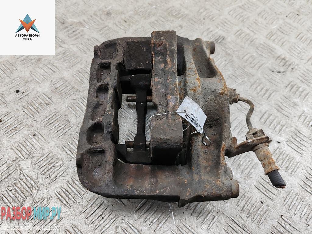 суппорт передний правый Volkswagen Transporter T4 1993, 2.4 л., дизель, МКПП, красный, микроавтобус - фото №1