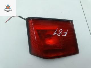 фонарь крышки багажника левый Mitsubishi Carisma 1 поколение 1997, 1.8 л., бензин, МКПП, чёрный, хетчбэк 5 дв.