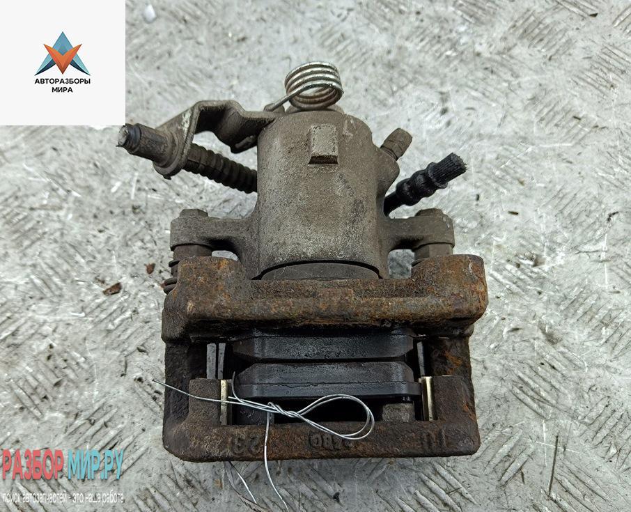 суппорт задний левый Opel Zafira 2 поколение (B) 2006, 1.9 л., дизель, МКПП, серый, минивэн - фото №1