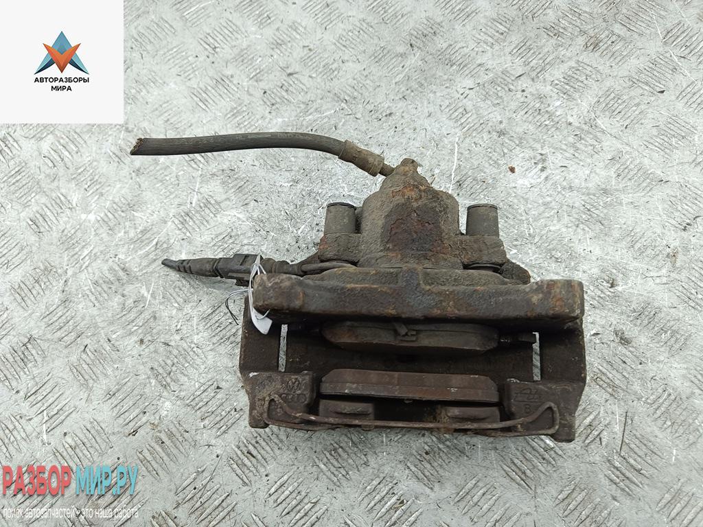 суппорт передний левый Volkswagen Passat B7 2013, 2.0 л., дизель, АКПП, серый, универсал - фото №1