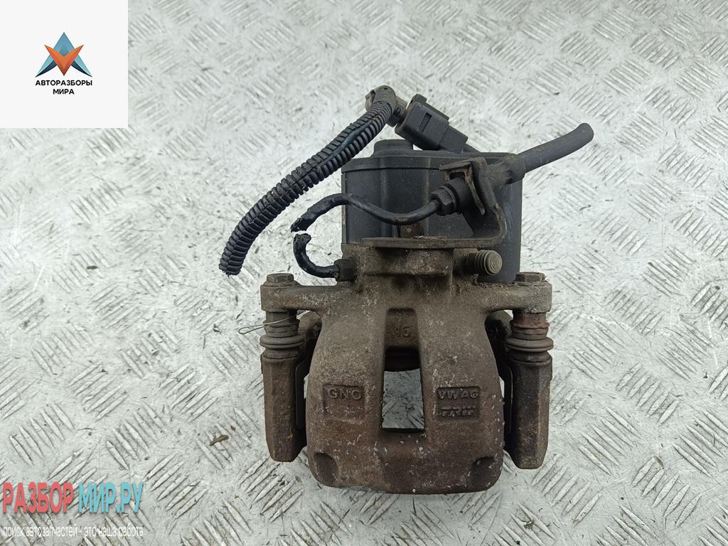 суппорт задний левый Volkswagen Passat B6 2005, 2.0 л., дизель, МКПП, серый, универсал - фото №1