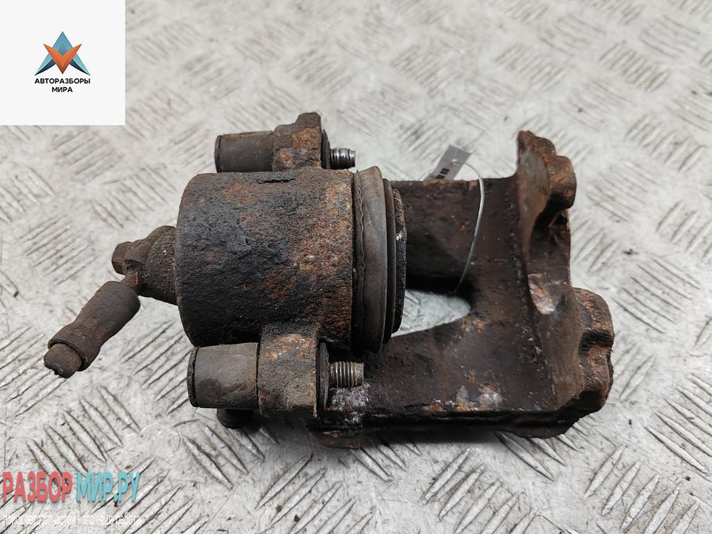 суппорт передний левый Volkswagen Golf 4 поколение 2000, 2.0 л., бензин, АКПП, серый, универсал - фото №1