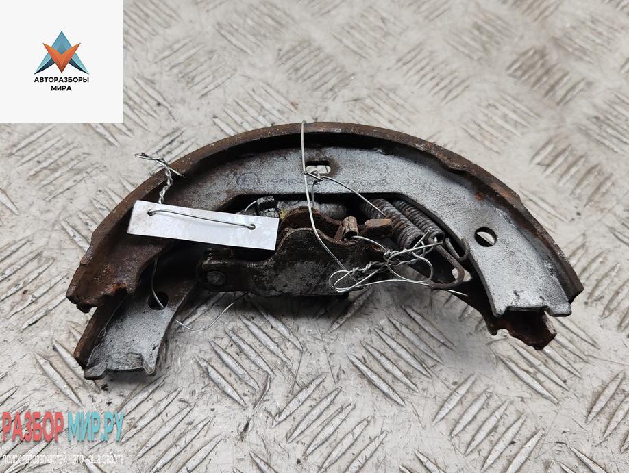 Механизм развода задних тормозных колодок левый BMW 3 серия E90/E91/E92/E93 2005, 2.0 л., бензин, МКПП, чёрный, универсал - фото №1