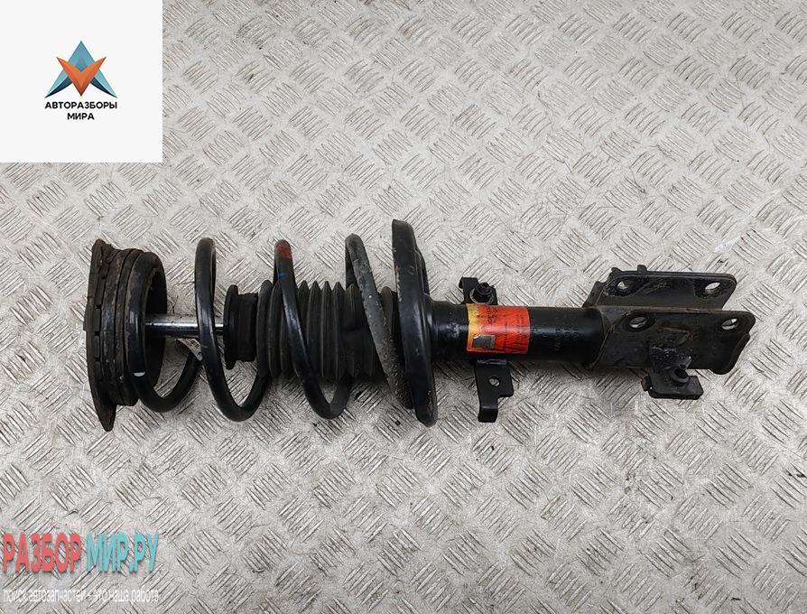 стойка передняя Renault Laguna 3 поколение 2008, 2.0 л., дизель, АКПП, чёрный, универсал, 757476P - фото №1