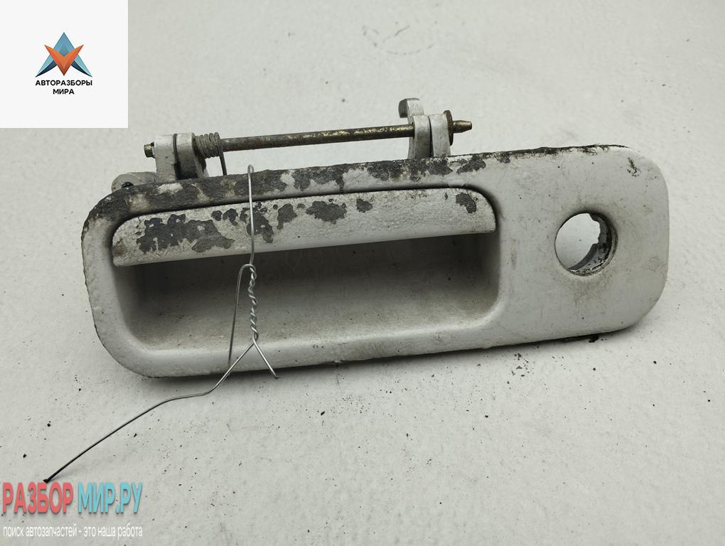 ручка крышки багажника Volkswagen Golf 3 поколение 1998, белый, универсал, 6N0827565A - фото №1