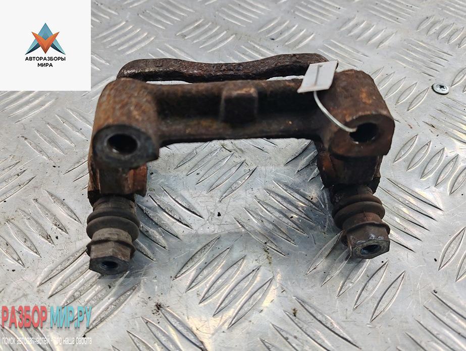 скоба суппорта Opel Astra G 1999, 1.6 л., бензин, МКПП, синий, универсал - фото №1