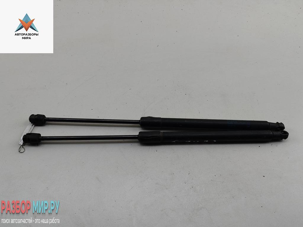 амортизатор крышки багажника (3-5 двери) Volkswagen Passat B6 2006, 2.0 л., дизель, МКПП, чёрный, универсал, 3C9827550A - фото №1