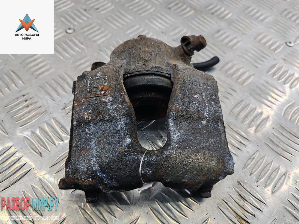 суппорт передний левый Opel Astra G 1999, 1.6 л., бензин, МКПП, синий, универсал - фото №1