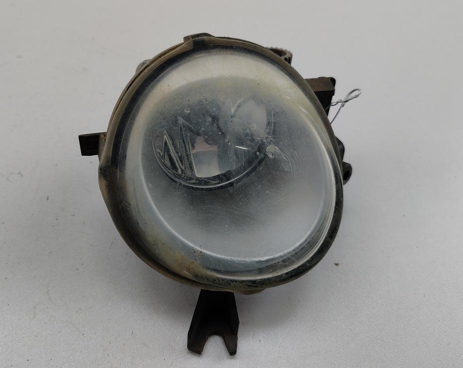 фара противотуманная левая Volkswagen Touareg 1 поколение 2006, 3.0 л., дизель, АКПП, серый, внедорожник 5 дв., 7L6941699E - фото №1