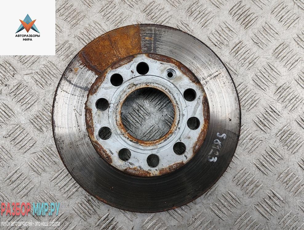 диск тормозной задний Volkswagen Caddy 3 поколение 2006, 1.9 л., дизель, МКПП, красный, фургон - фото №1