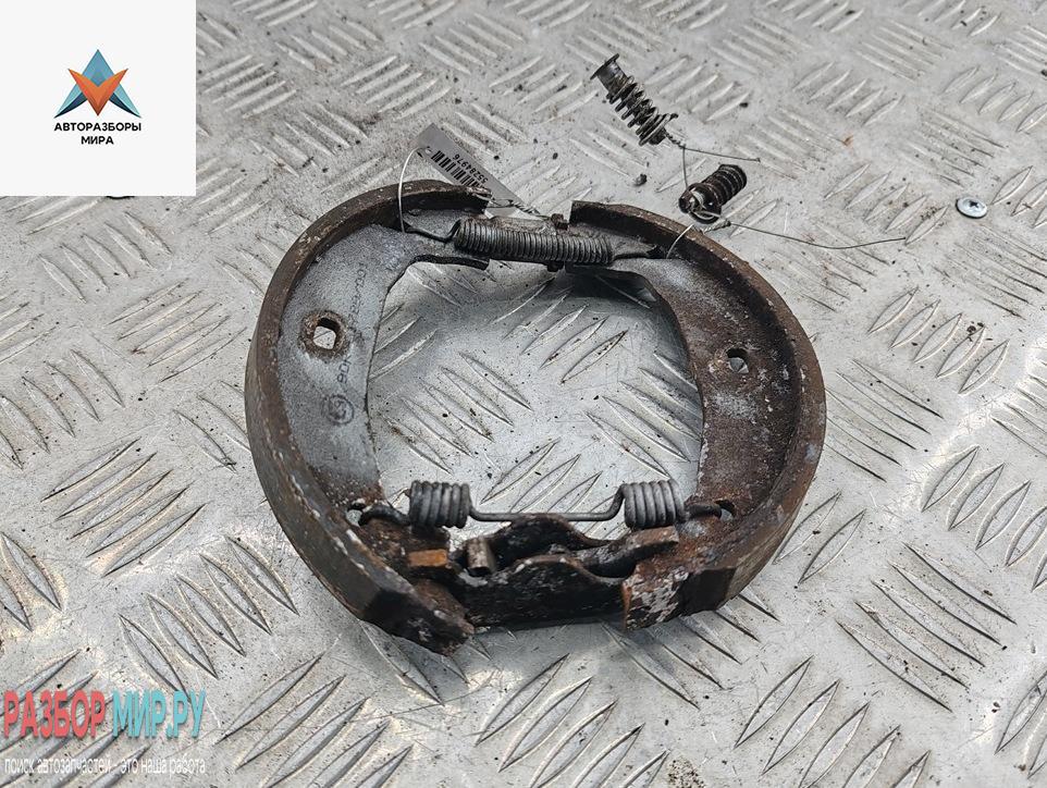 Механизм развода задних тормозных колодок левый BMW 3 серия E90/E91/E92/E93 2006, 2.0 л., бензин, МКПП, чёрный, седан - фото №1