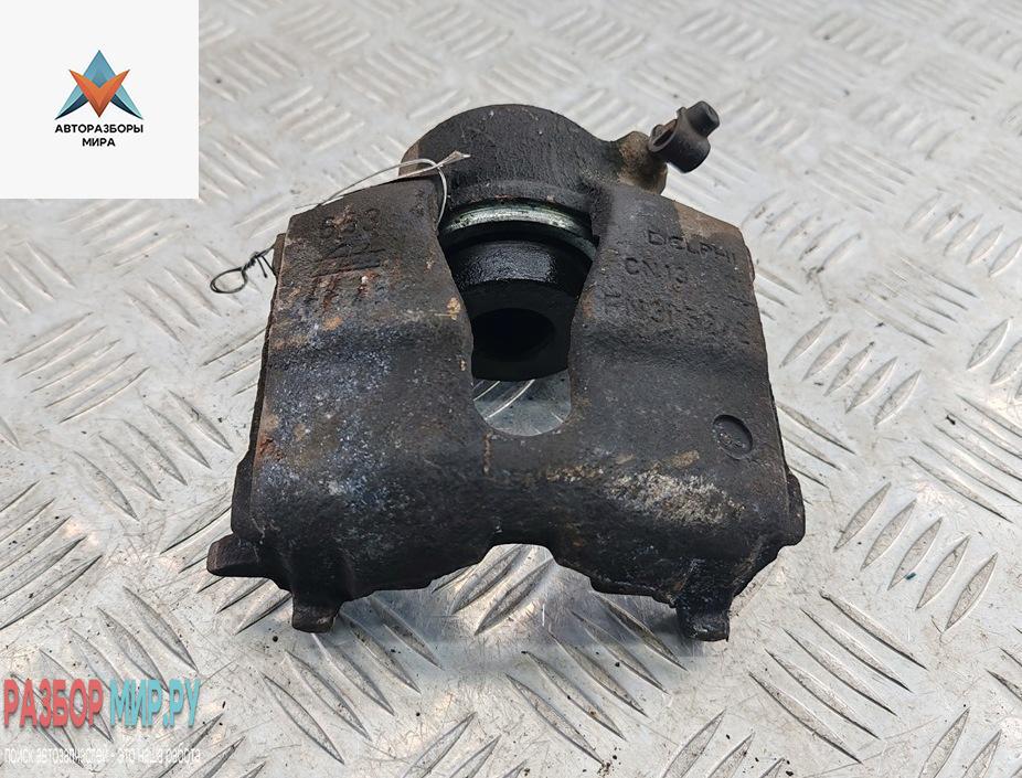 суппорт передний левый Opel Astra G 2001, 1.6 л., бензин, АКПП, серый, универсал - фото №1