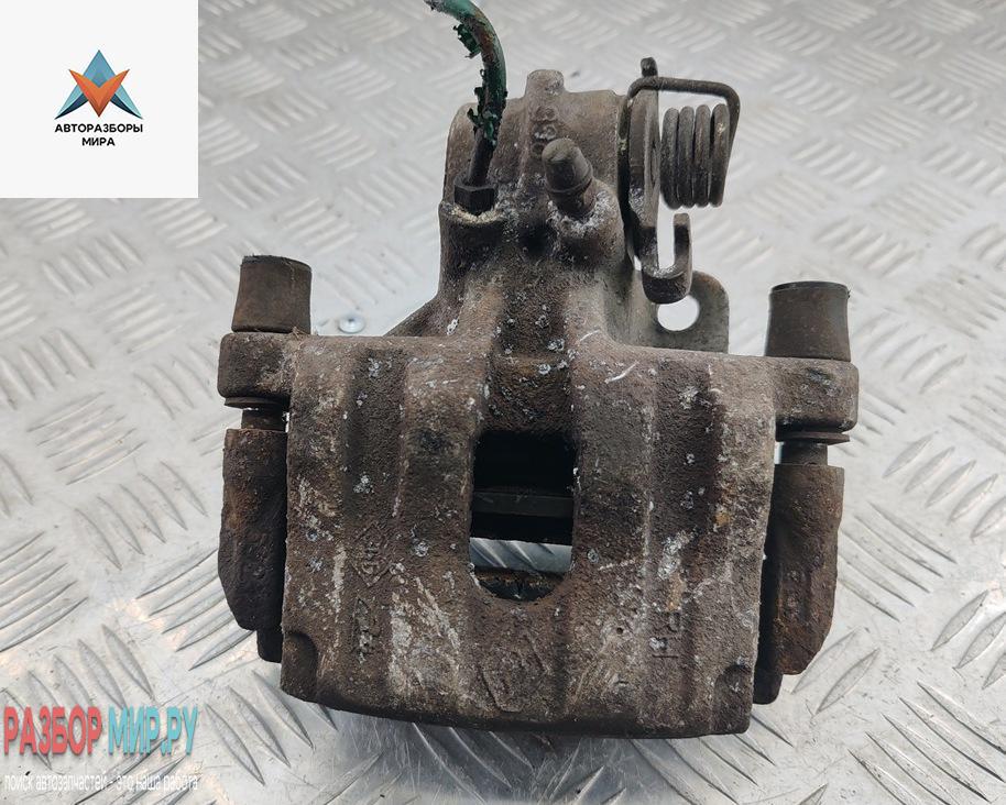 суппорт задний правый Renault Espace 4 поколение 2004, 2.0 л., бензин, МКПП, чёрный, минивэн - фото №1