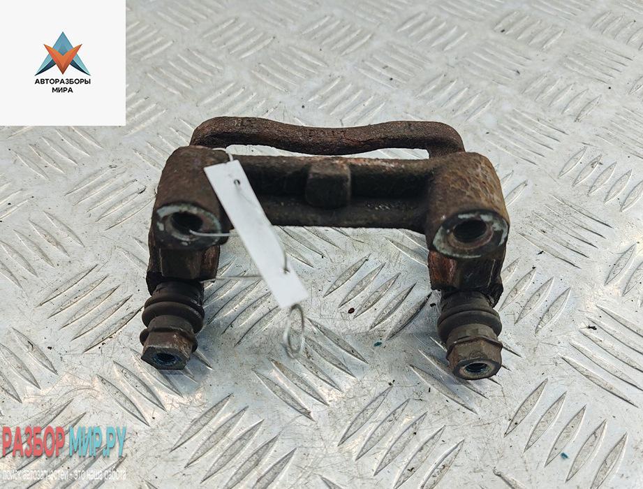 скоба суппорта Opel Astra G 2001, 1.6 л., бензин, АКПП, серый, универсал - фото №1