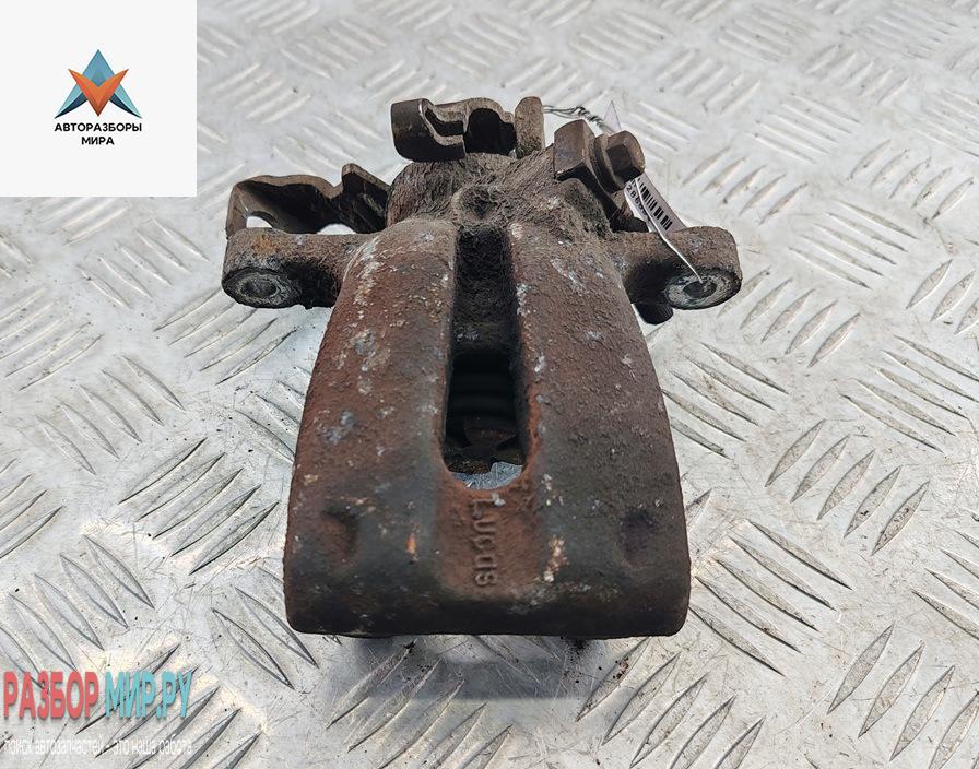 суппорт задний правый Opel Astra G 2001, 1.6 л., бензин, АКПП, серый, универсал - фото №1