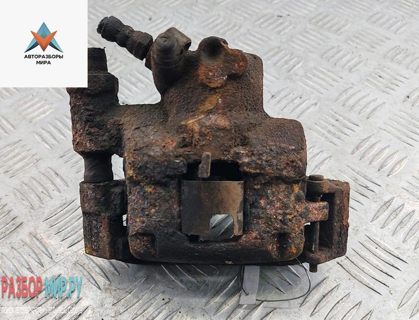 суппорт передний правый Fiat Panda 2 поколение 2009, 1.2 л., бензин, МКПП, чёрный, хетчбэк 5 дв. - фото №1