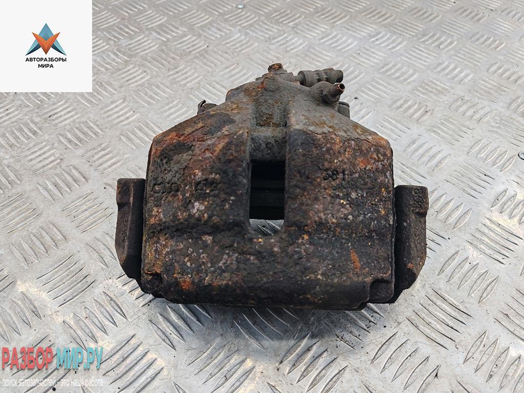 суппорт передний левый Volkswagen Caddy 3 поколение 2006, 1.9 л., дизель, МКПП, красный, фургон - фото №1