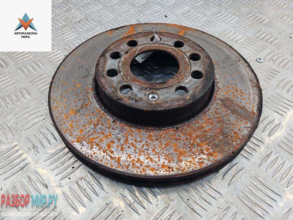 диск тормозной передний Volkswagen Caddy 3 поколение 2006, 1.9 л., дизель, МКПП, красный, фургон - фото №1