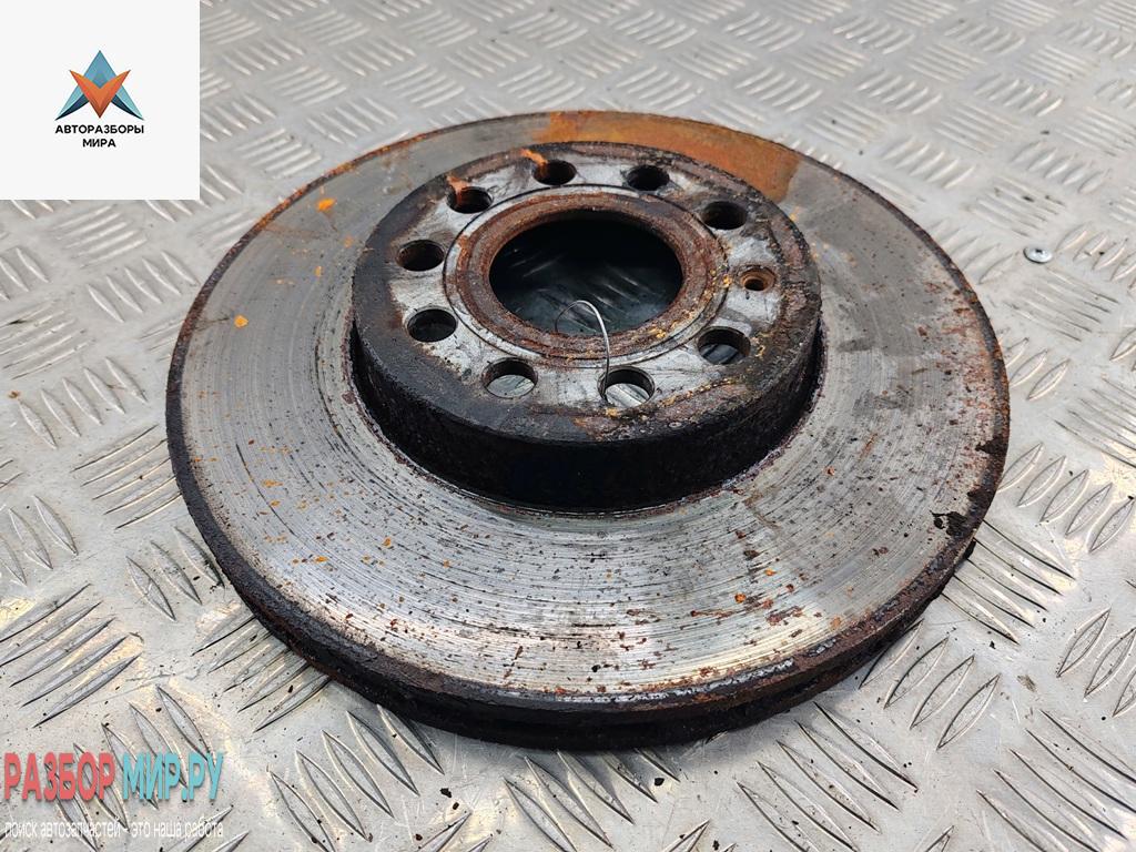 диск тормозной передний Volkswagen Caddy 3 поколение 2006, 1.9 л., дизель, МКПП, красный, фургон - фото №1