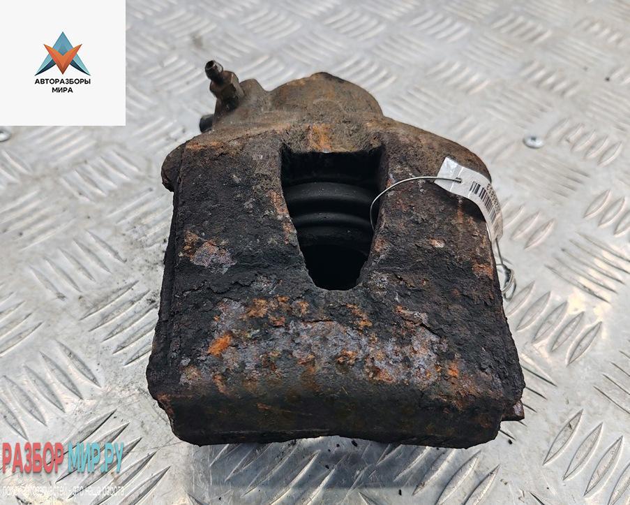 суппорт передний правый Skoda Yeti 1 поколение 2010, 2.0 л., дизель, МКПП, коричневый, внедорожник 5 дв. - фото №1