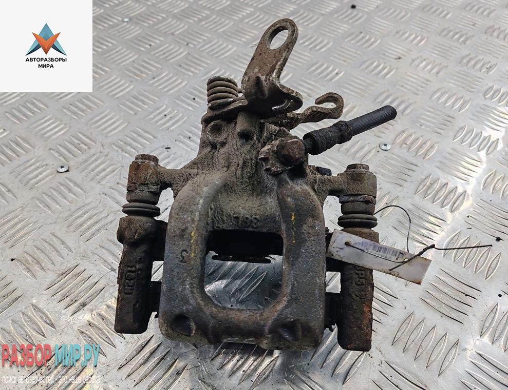 суппорт задний левый Volkswagen Golf 6 поколение 2010, 1.6 л., дизель, МКПП, серый, универсал - фото №1