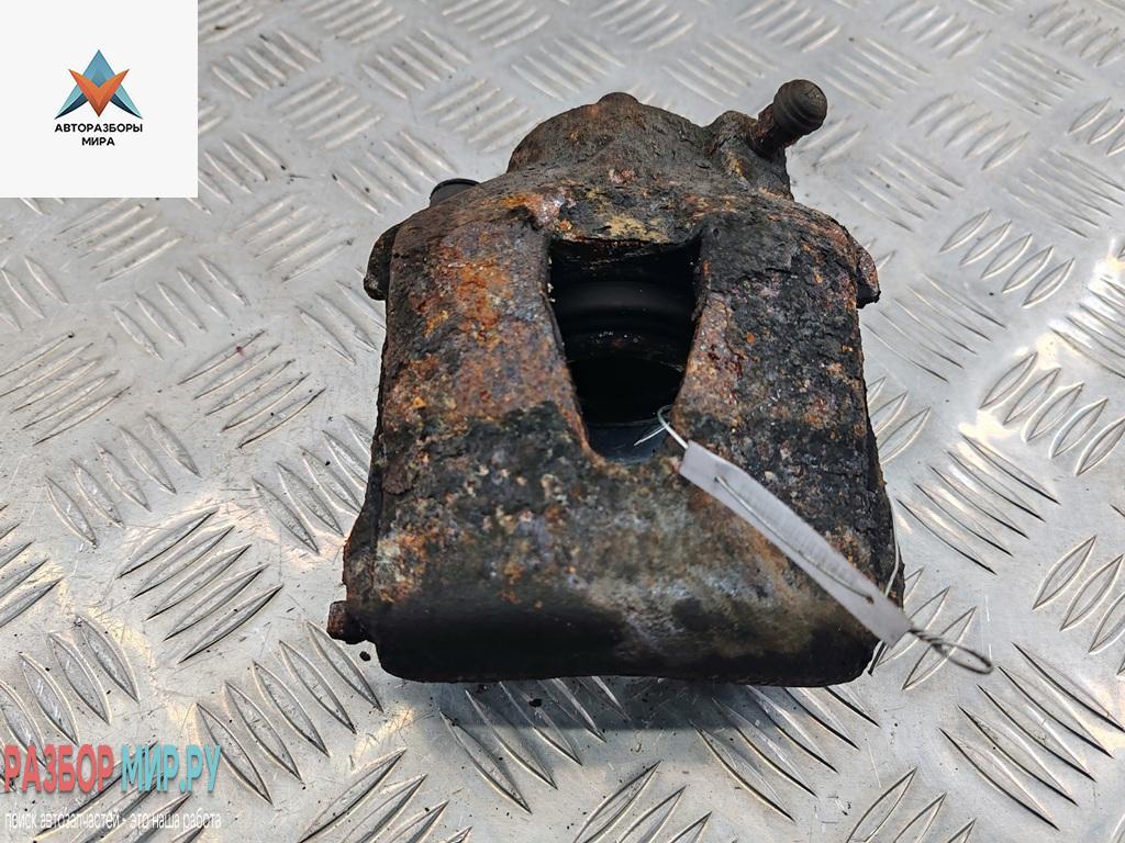 суппорт передний левый Volkswagen Golf 4 поколение 1999, 1.9 л., дизель, МКПП, синий, хетчбэк 5 дв. - фото №1