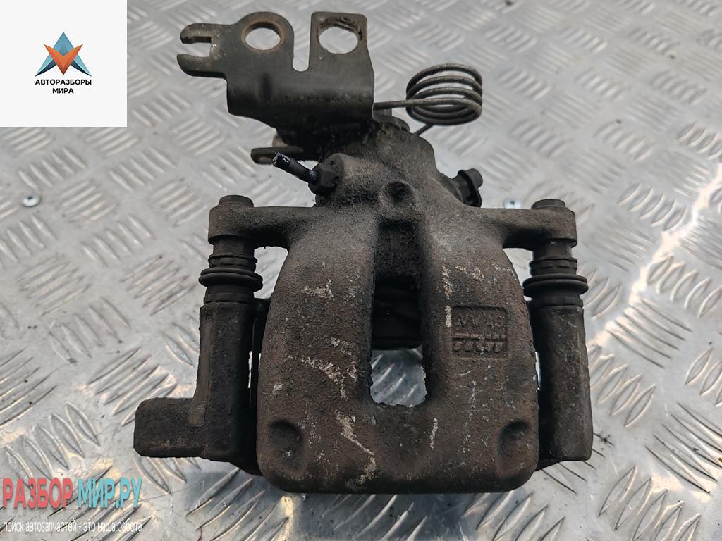 суппорт задний левый Volkswagen Caddy 3 поколение 2006, 1.9 л., дизель, МКПП, красный, фургон - фото №1