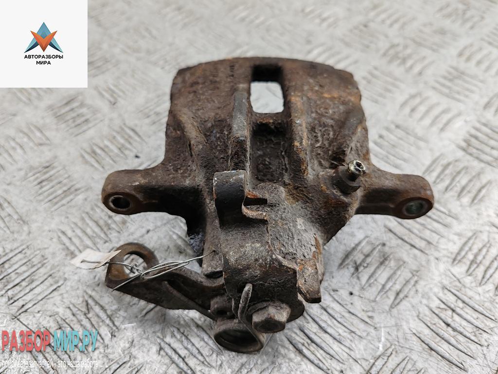 суппорт задний левый Volkswagen Transporter T4 1997, 1.9 л., дизель, МКПП, белый, микроавтобус - фото №1