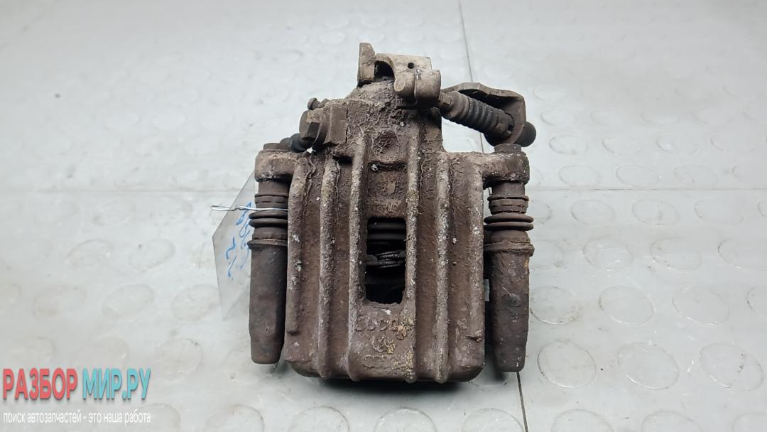 суппорт задний левый Skoda Rapid 1 поколение 2013, 1.6 л., дизель, МКПП, хетчбэк 5 дв. - фото №1