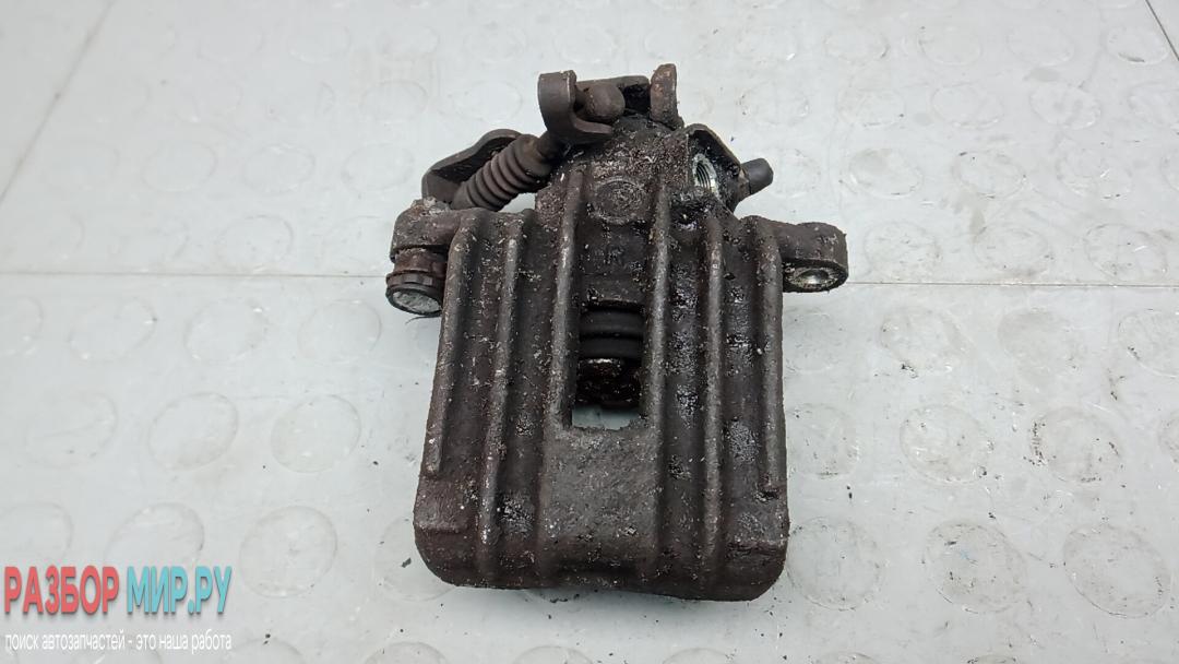 суппорт задний правый Skoda Rapid 1 поколение 2014, 1.6 л., дизель, МКПП, хетчбэк 5 дв. - фото №1