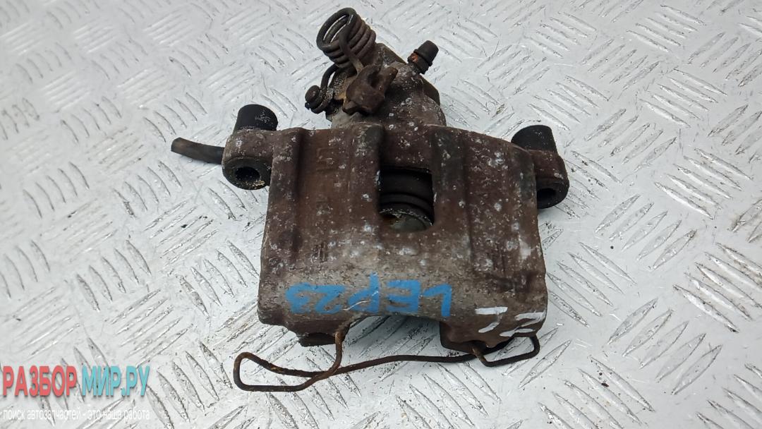 суппорт задний левый Ford Focus 3 поколение 2012, 1.6 л., бензин, МКПП, универсал - фото №1