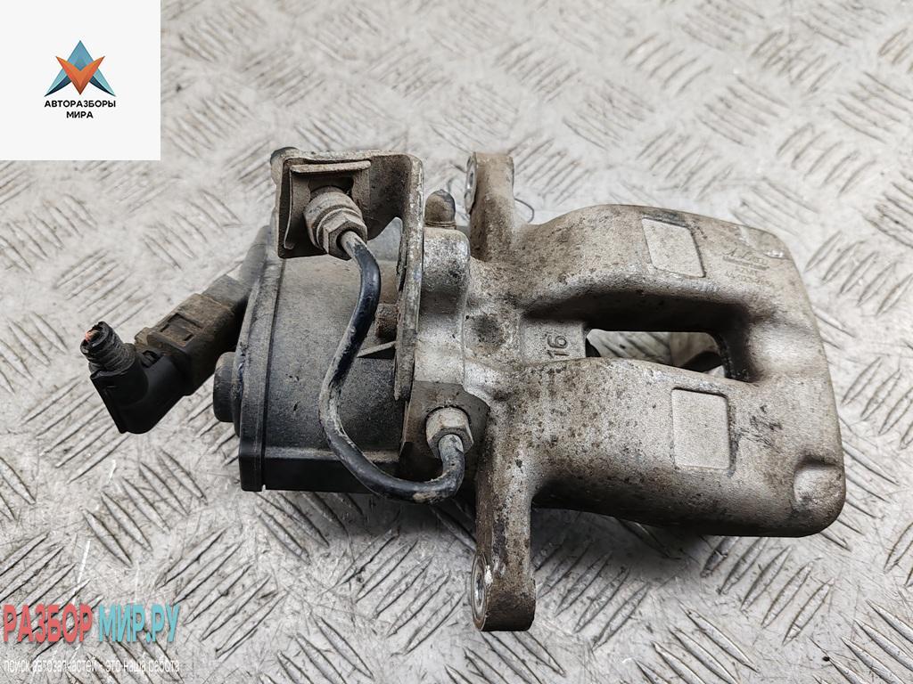 суппорт задний левый Volkswagen Passat B6 2006, 2.0 л., бензин, МКПП, серый, седан - фото №1