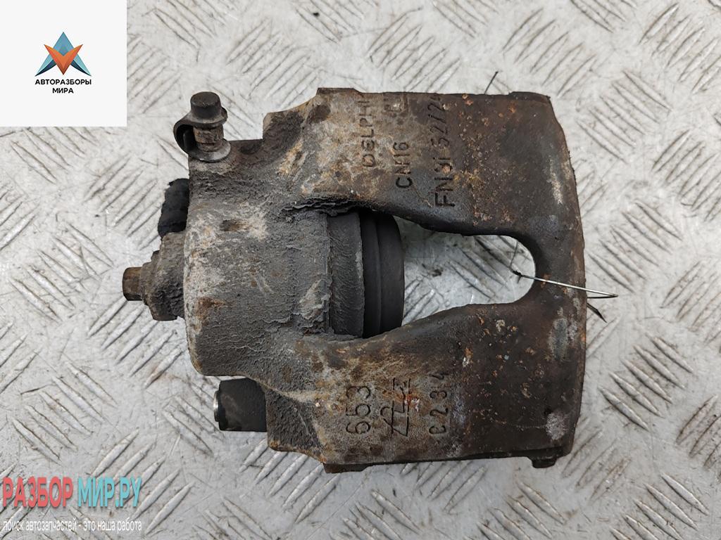 суппорт передний левый Opel Astra G 2002, 1.6 л., бензин, МКПП, серый, хетчбэк 5 дв. - фото №1