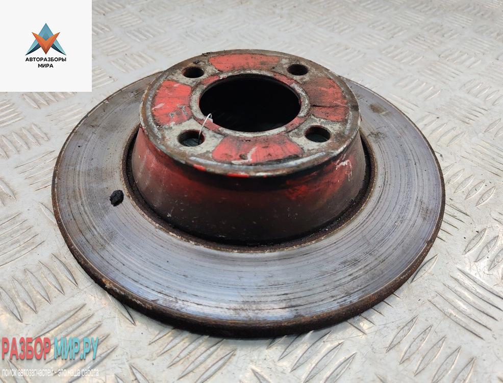 диск тормозной передний Audi 80 8C/B4 1992, 2.0 л., бензин, МКПП, красный, седан - фото №1
